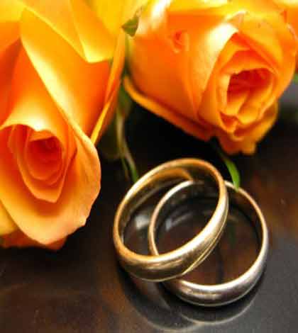 two roses and rings symbolizing moving on after a break up