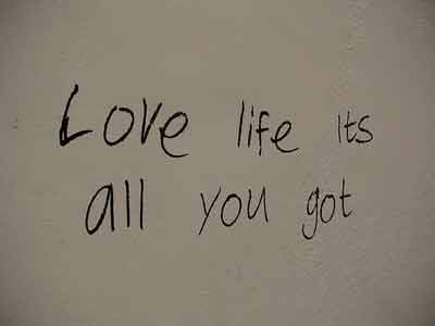 a handwritten note with text love the life you live as its all you got