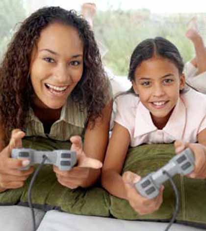 Mother setting healthy boundary with her teen child playing video games