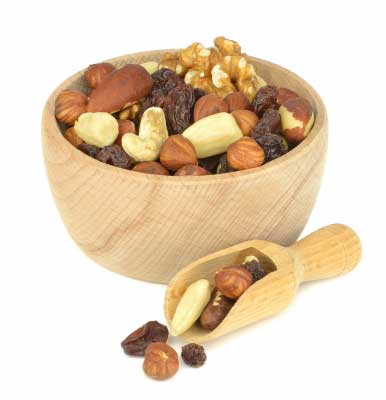 a bowl containing all good fat nuts