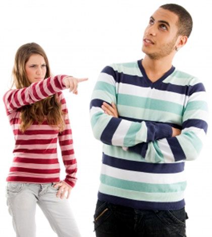 a girl pointing finger to boyfriend having friendship problems