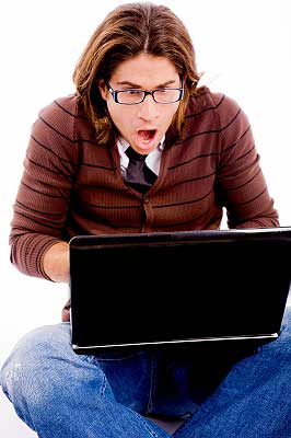 A man watching porn on laptop as ways to reduce stress