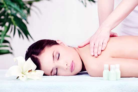 woman getting massaged for relieving stress