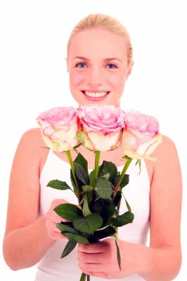 girl wishing with three flowers