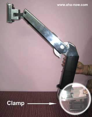 Workstation arm with clamp
