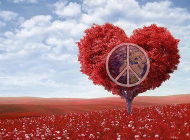 A red tree in the shape of heart with the world peace symbol inside