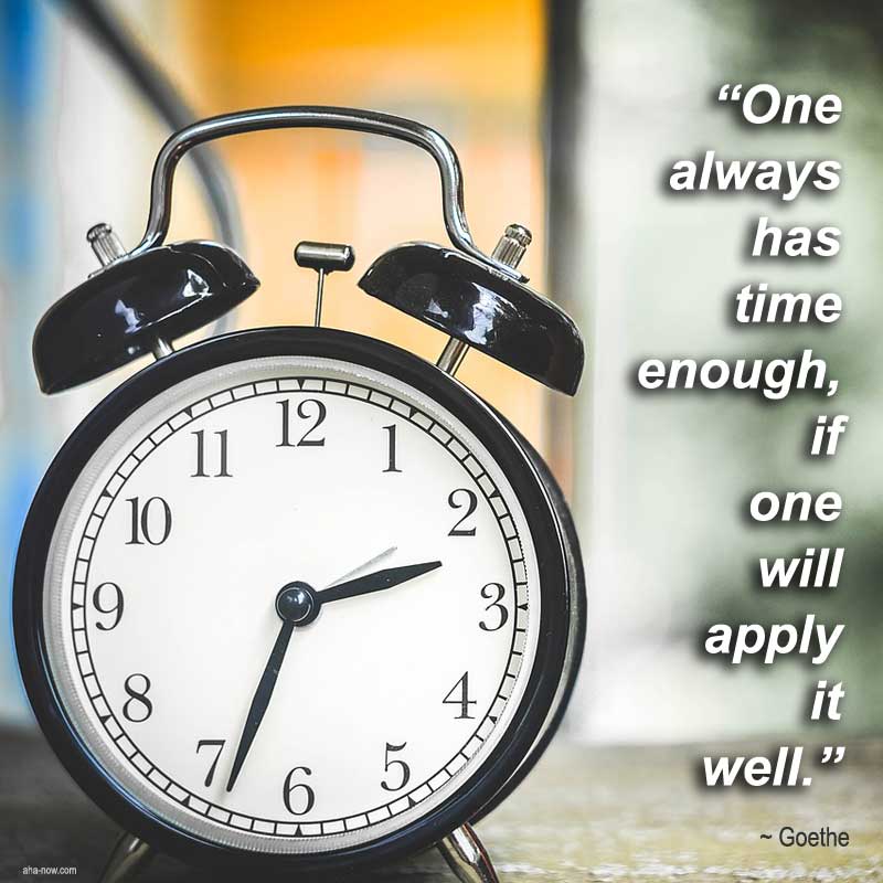 A clock and a quote about utilizing time.