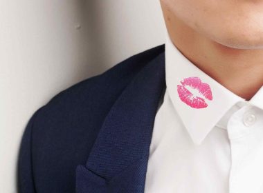 A kiss mark on shirt collar of man
