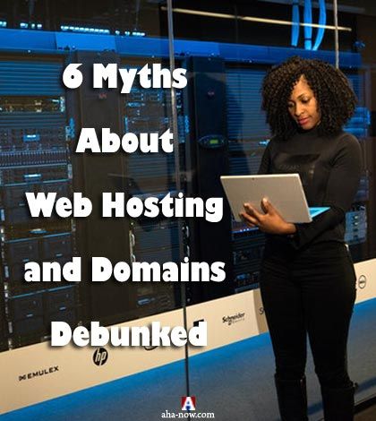Woman with laptop in hand standing before servers debunking the web hosting myths