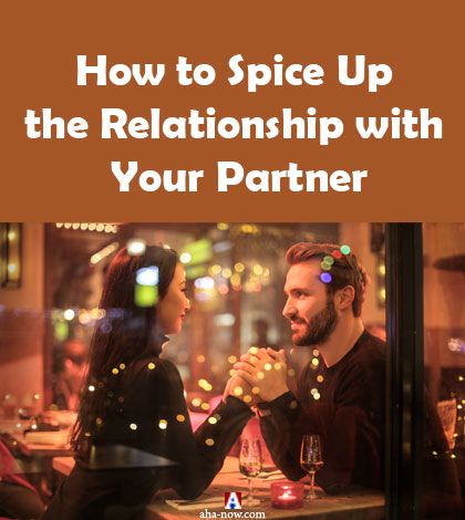 Man and woman holding hands on a date trying to spice up their relationship