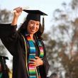 A woman college graduate completing college education