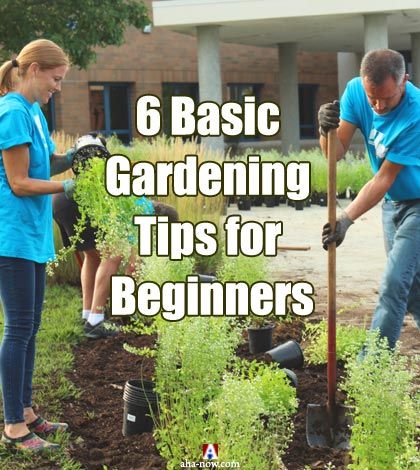 Family learning gardening tips in garden