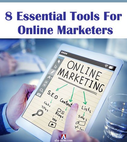 Online marketer with tablet in hand searching for online marketing tools
