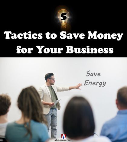 Manager giving presentation to employees teaching tactics to save money in business