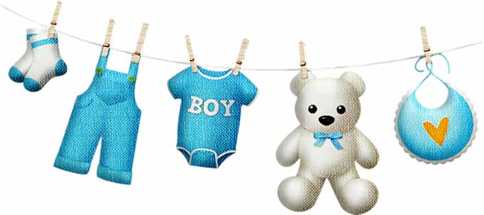 Baby boy clothes hanging on a drying line with a teddy bear