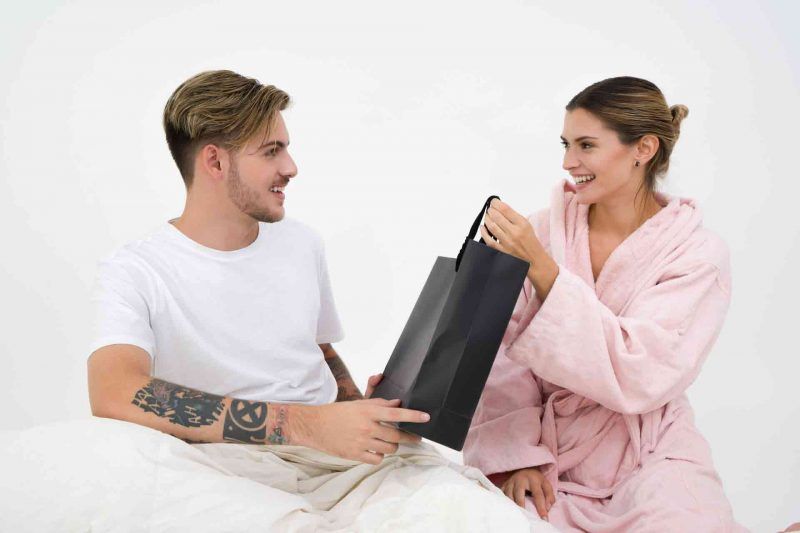 Man gifting to the woman he loves