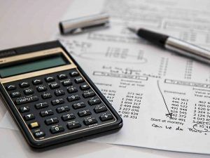 calculator with tax filing documents